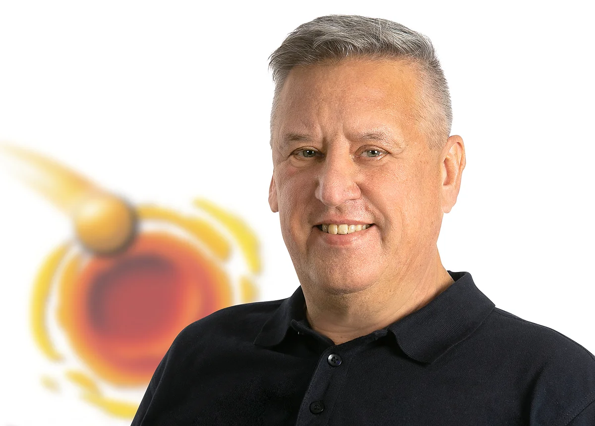 Das Porträtfoto zeigt den Geoparkführer Karl Heinz John.