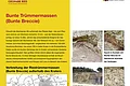 Informationstafel über bunte Trümmermassen im Geopark Ries mit Informations-Text, Karten und Fotos von Gesteinsformationen.